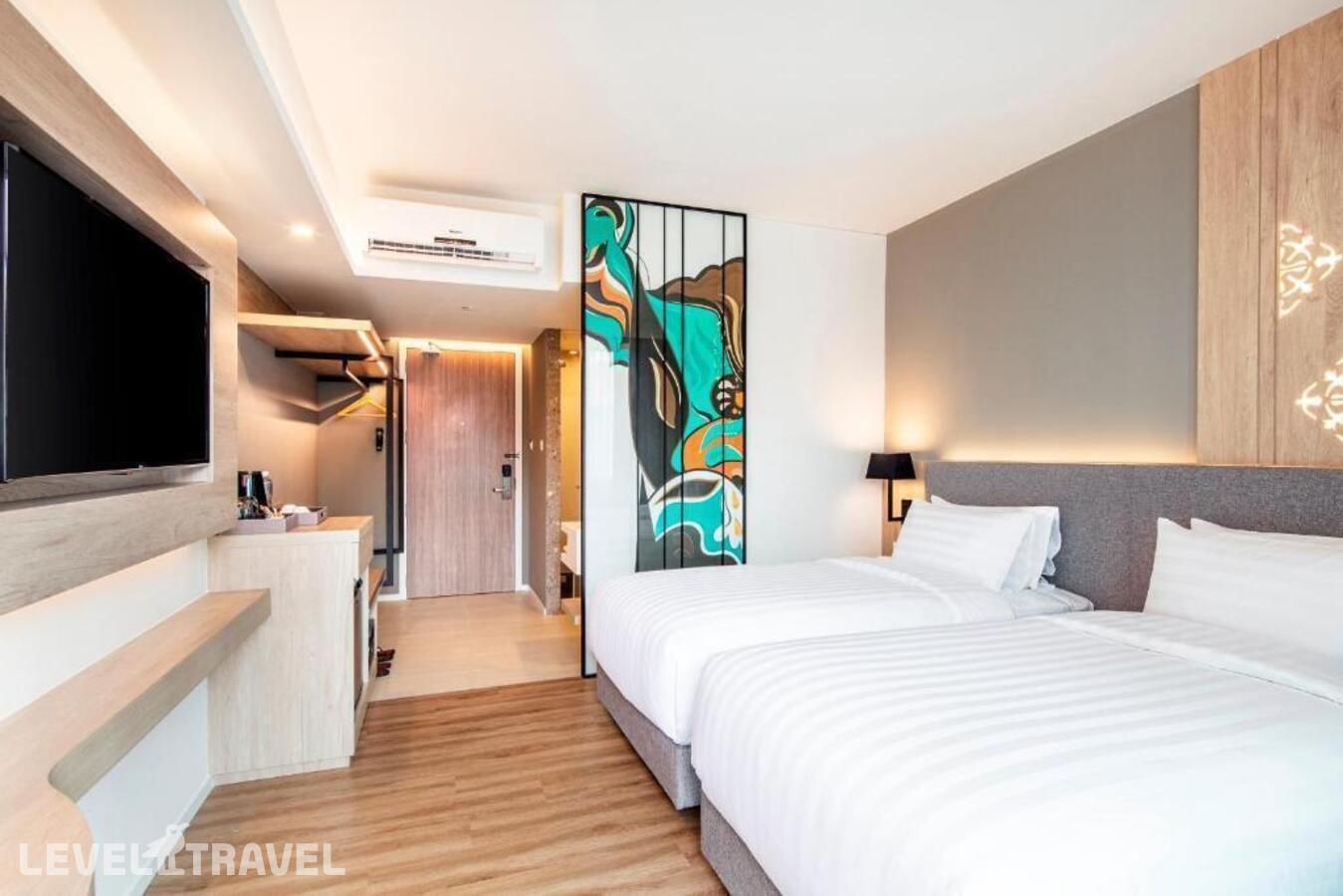 фотографии номера Делюкс (две односпальные кровати) отеля Hotel Amber Pattaya в Таиланд(Центральная Паттайя) - фото №6