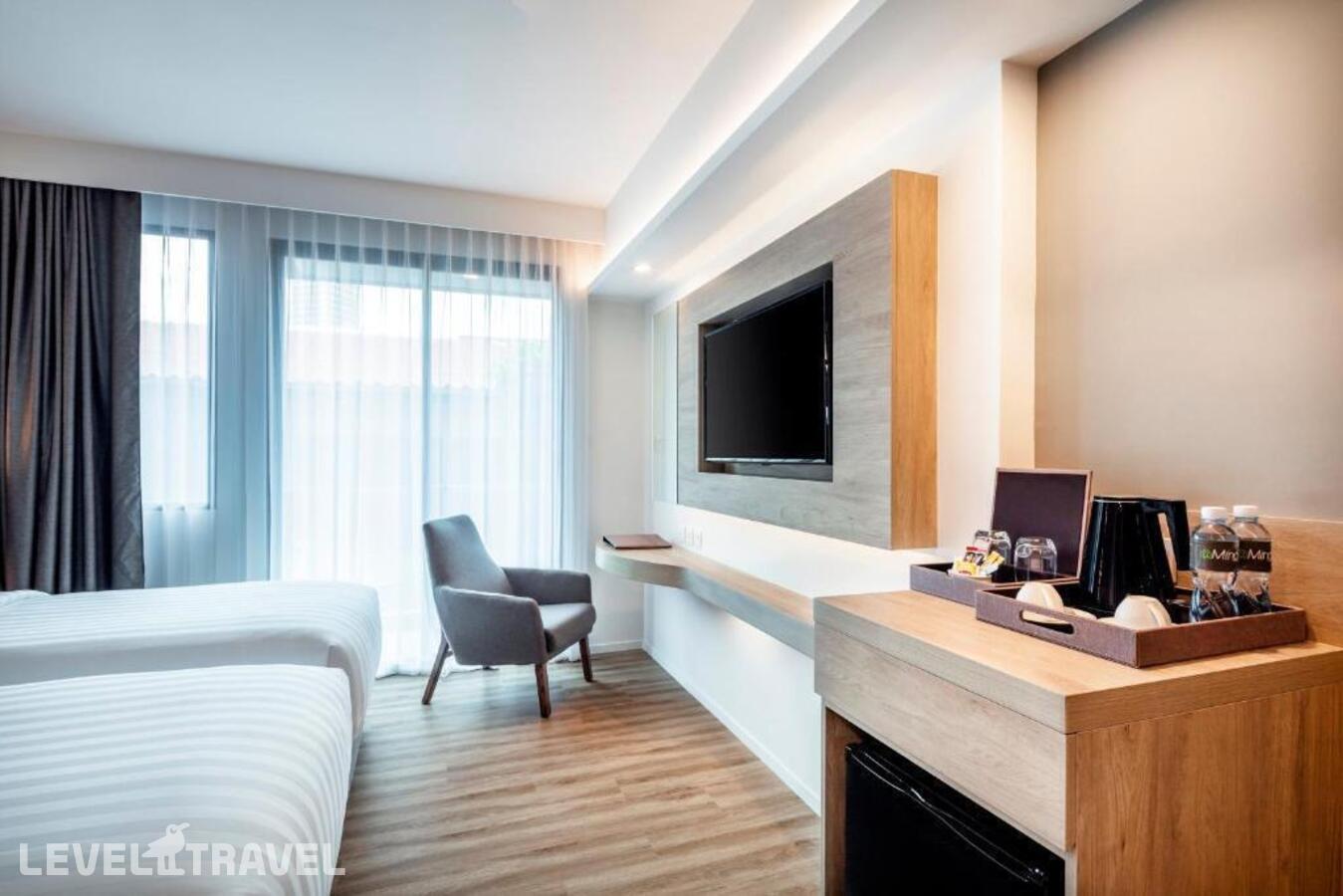 фотографии номера Делюкс (две односпальные кровати) отеля Hotel Amber Pattaya в Таиланд(Центральная Паттайя) - фото №5