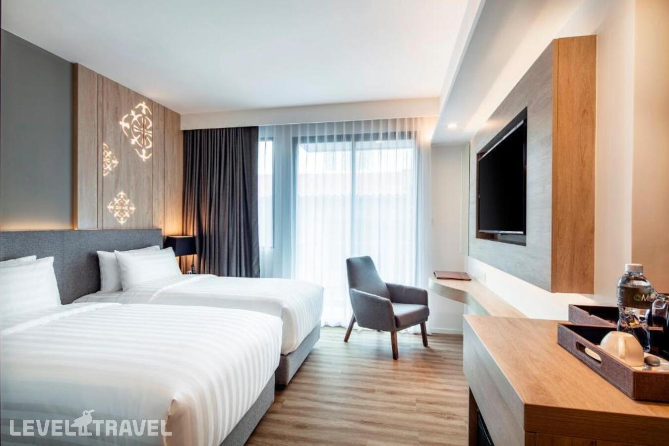 фотографии номера Делюкс (две односпальные кровати) отеля Hotel Amber Pattaya в Таиланд(Центральная Паттайя) - фото №1