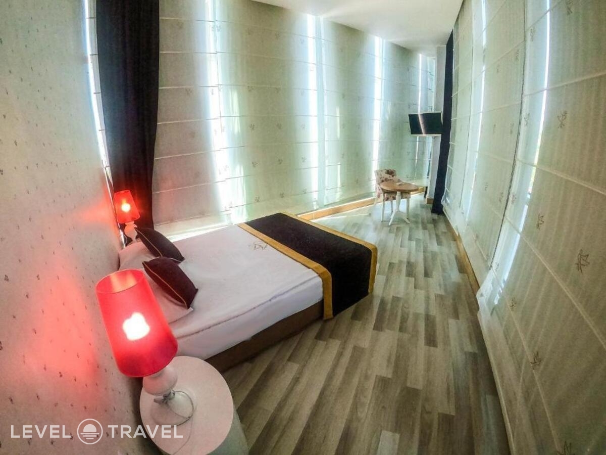 фотографии номера Улучшенный с видом на окрестности отеля Raymar Resort&Aqua в Турция(Кызылот) - фото №1