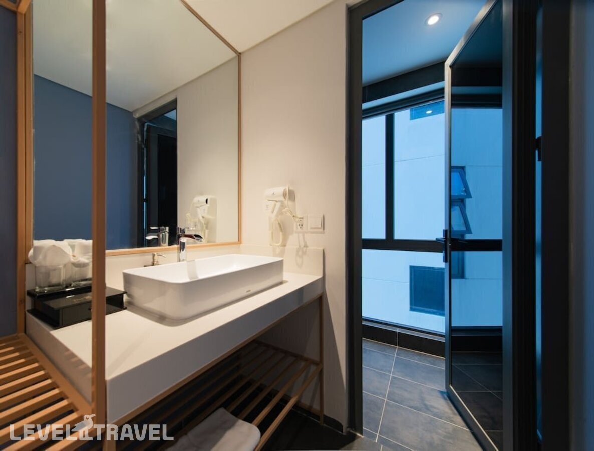фотографии номера Делюкс (две односпальные кровати) отеля The Time Hotel Nha Trang в Вьетнам(Нячанг) - фото №2