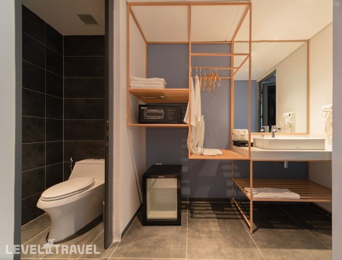 фотографии номера Делюкс (две односпальные кровати) отеля The Time Hotel Nha Trang в Вьетнам(Нячанг) - фото №1
