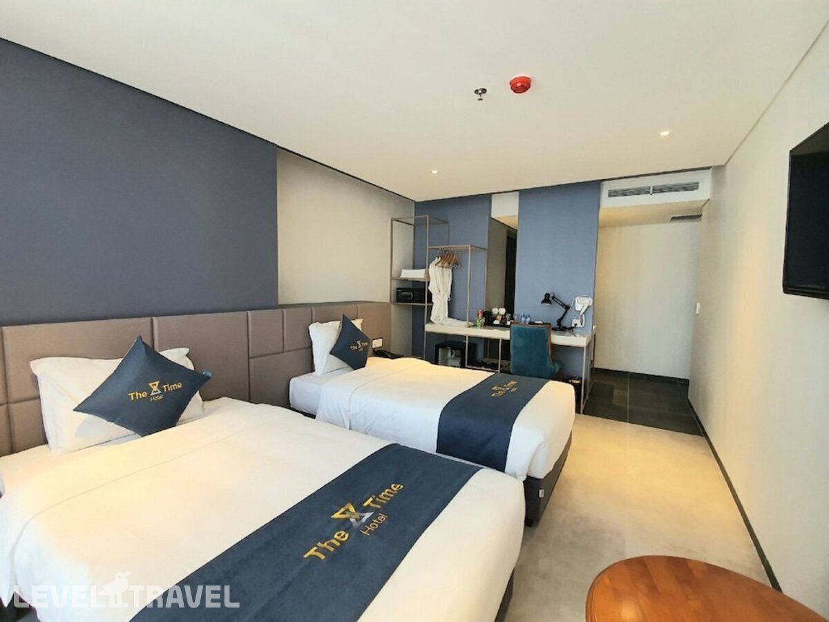 фотографии номера Делюкс (две односпальные кровати) отеля The Time Hotel Nha Trang в Вьетнам(Нячанг) - фото №3