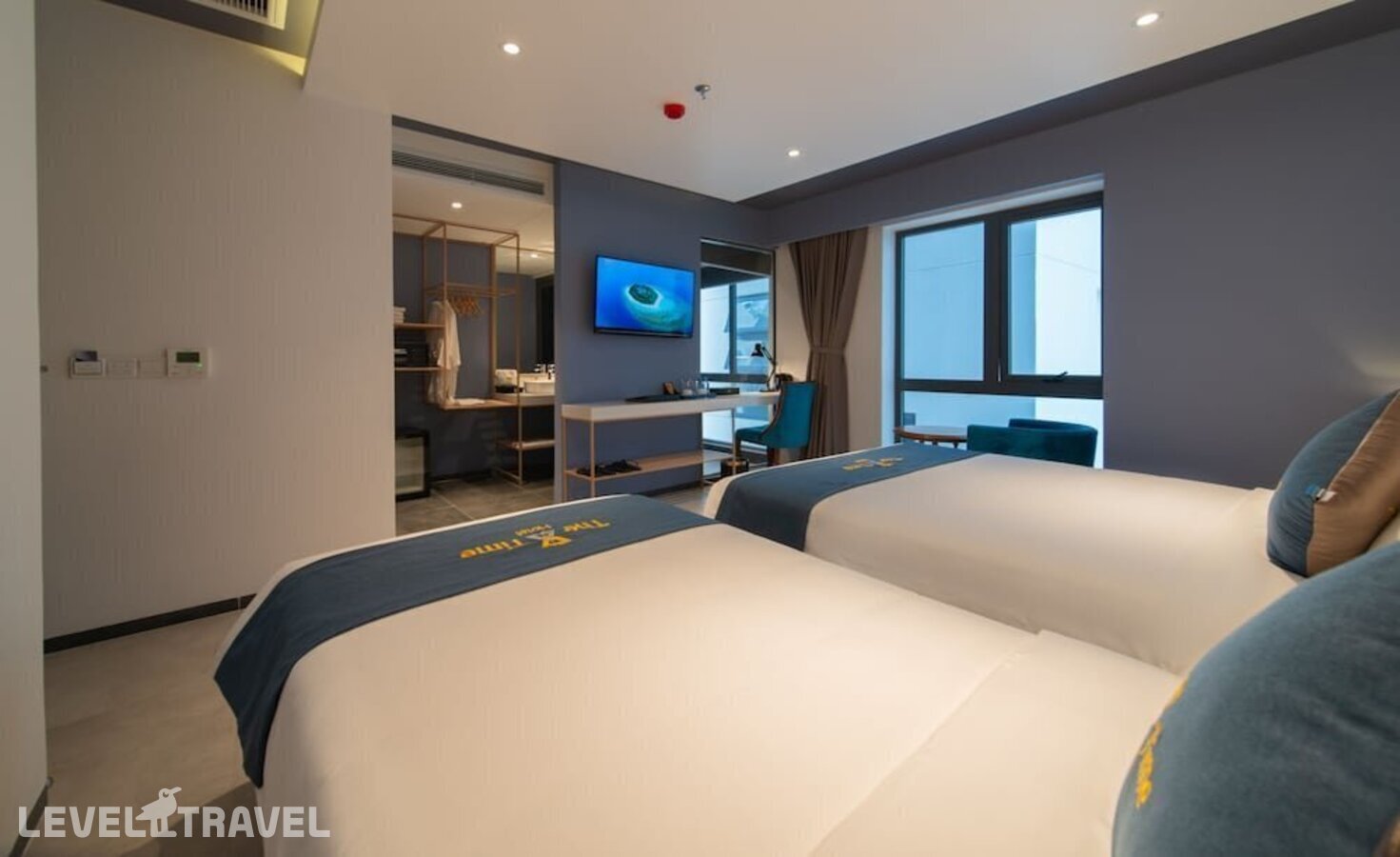 фотографии номера Делюкс (две односпальные кровати) отеля The Time Hotel Nha Trang в Вьетнам(Нячанг) - фото №12