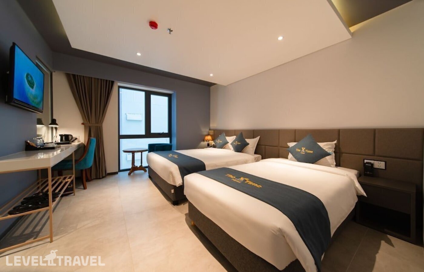 фотографии номера Делюкс (две односпальные кровати) отеля The Time Hotel Nha Trang в Вьетнам(Нячанг) - фото №10