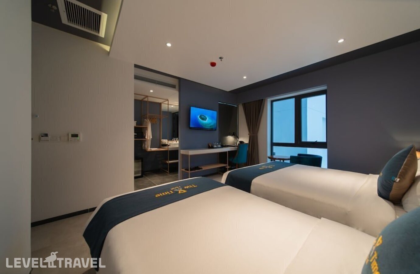 фотографии номера Делюкс (две односпальные кровати) отеля The Time Hotel Nha Trang в Вьетнам(Нячанг) - фото №7