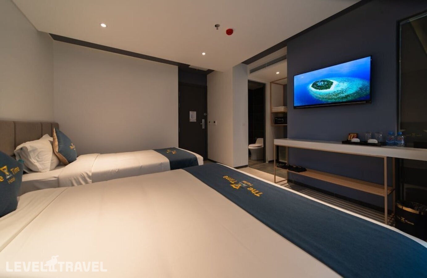 фотографии номера Делюкс (две односпальные кровати) отеля The Time Hotel Nha Trang в Вьетнам(Нячанг) - фото №8
