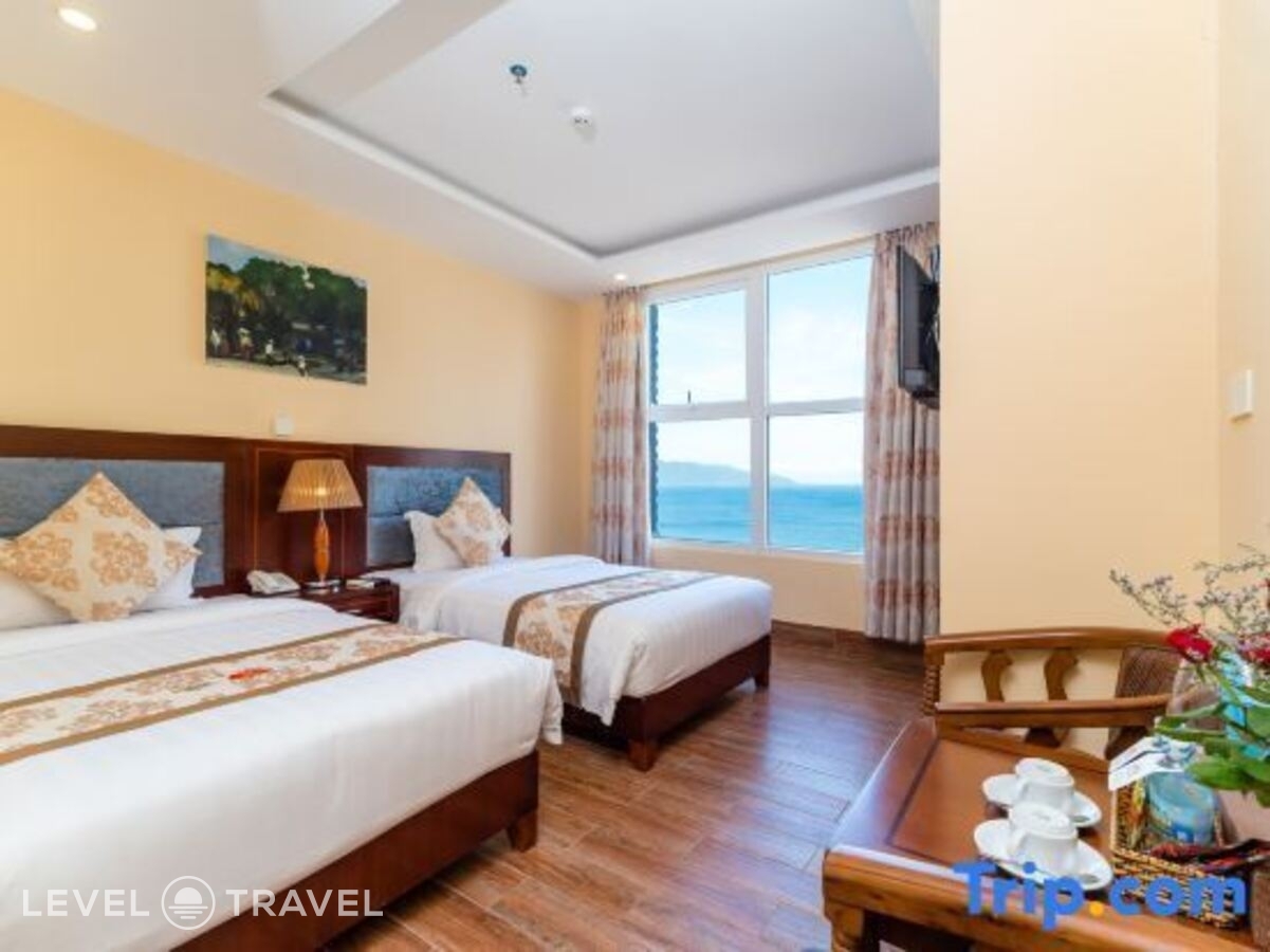 фотографии номера Делюкс с видом на море (две односпальные кровати) отеля Nhat Minh Hotel and Apartment в Вьетнам(Дананг) - фото №3
