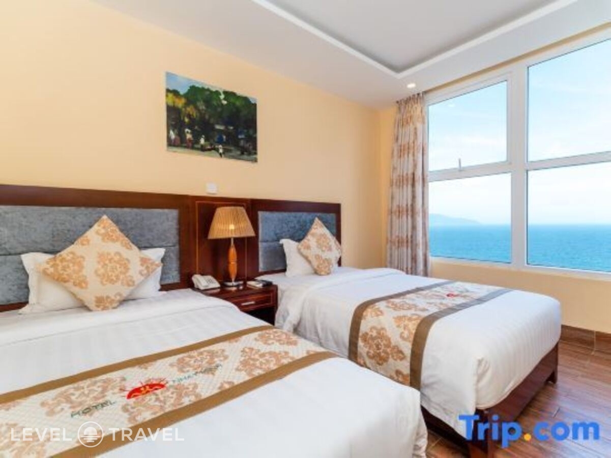 фотографии номера Делюкс с видом на море (две односпальные кровати) отеля Nhat Minh Hotel and Apartment в Вьетнам(Дананг) - фото №2