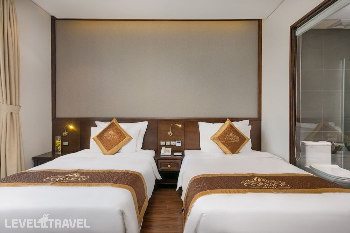 фотографии номера Делюкс с видом на океан с балконом отеля Cosmos Hotel Danang в Вьетнам(Дананг) - фото №7