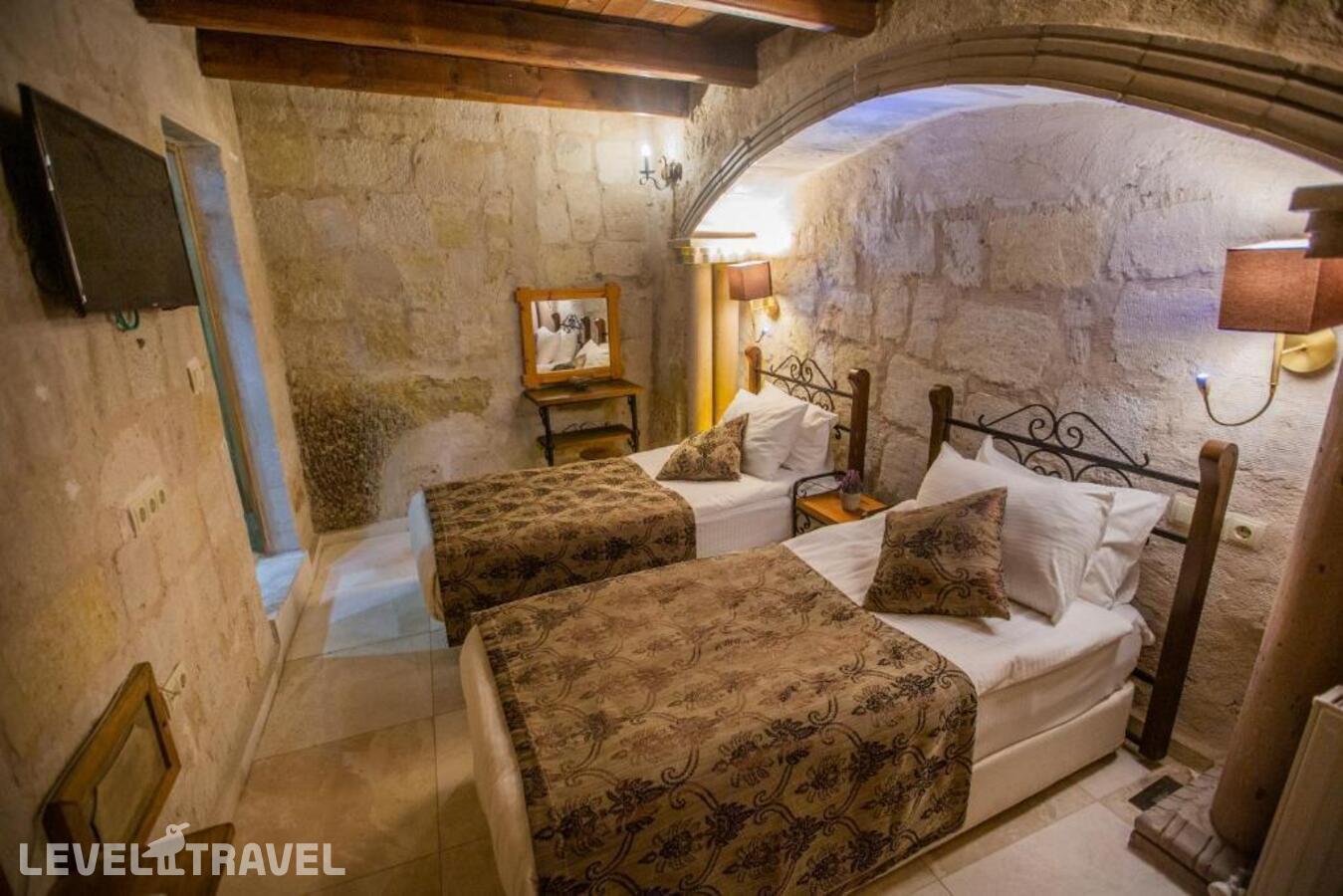 фотографии номера Стандартный (две односпальные кровати) отеля Divan Cave House в Турция(Гёреме) - фото №1