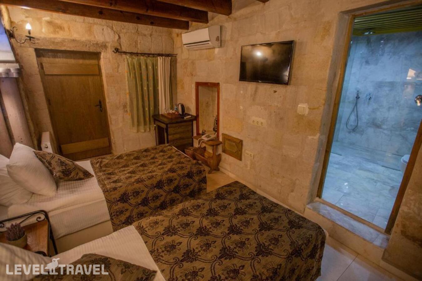 фотографии номера Стандартный (две односпальные кровати) отеля Divan Cave House в Турция(Гёреме) - фото №3
