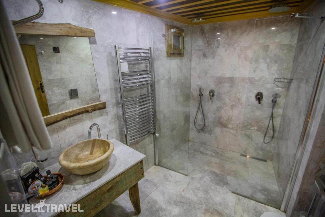фотографии номера Стандартный (две односпальные кровати) отеля Divan Cave House в Турция(Гёреме) - фото №5
