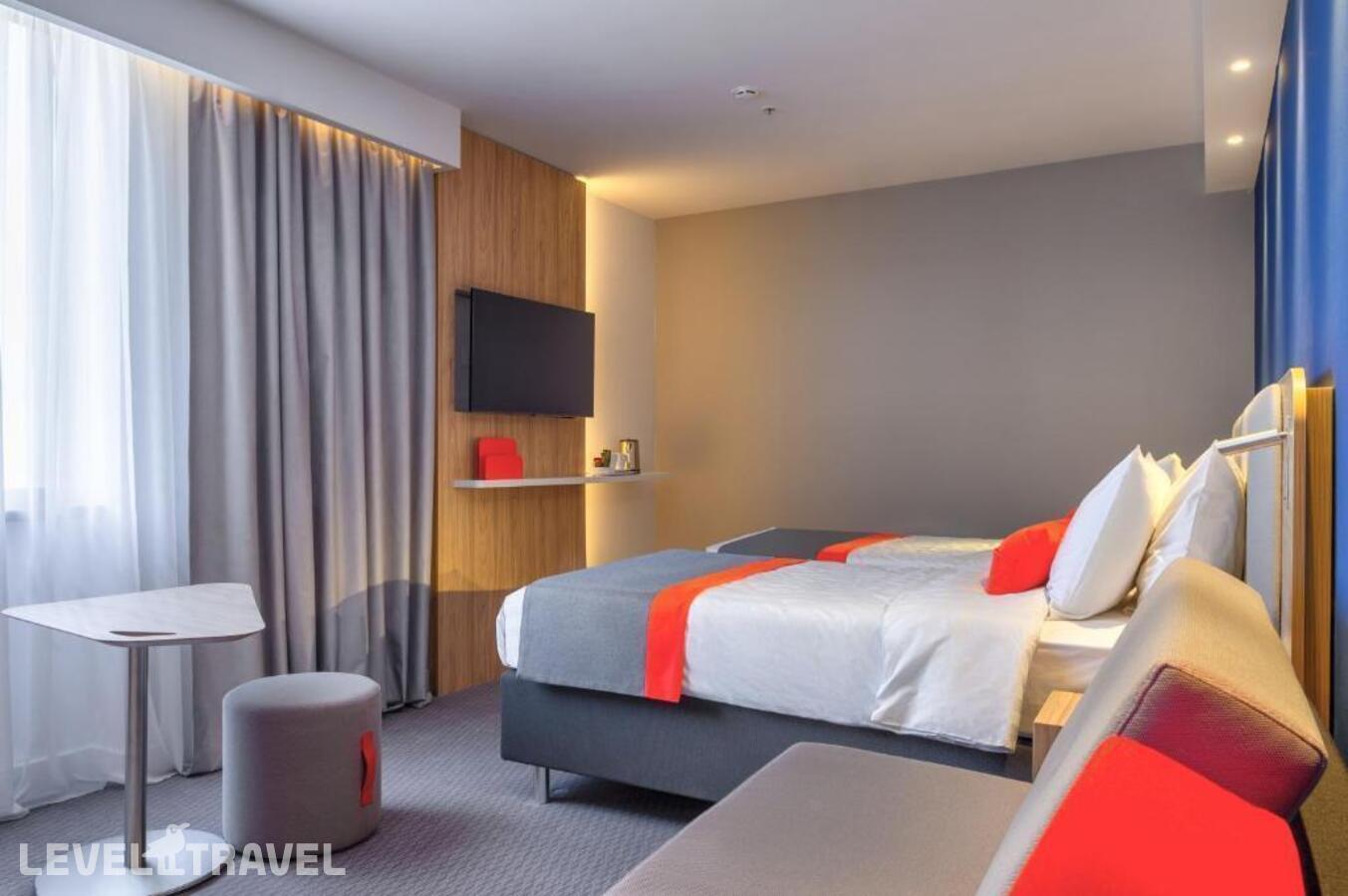 фотографии номера Стандартный (две односпальные кровати) отеля Holiday Inn Express Almaty в Казахстан(Алматы) - фото №5