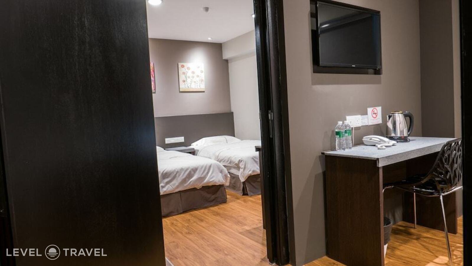 фотографии номера Стандартный (две односпальные кровати) отеля Kl Guest Hotel в Малайзия(Куала-Лумпур) - фото №5