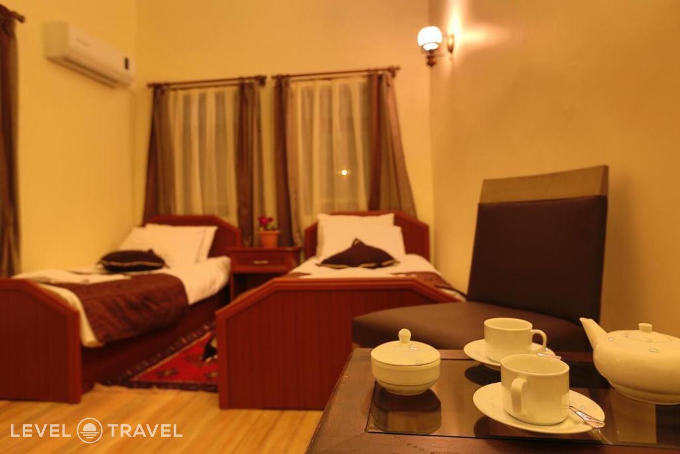 фотографии номера Стандартный (две односпальные кровати) отеля Guven Cave Hotel в Турция(Гёреме) - фото №3
