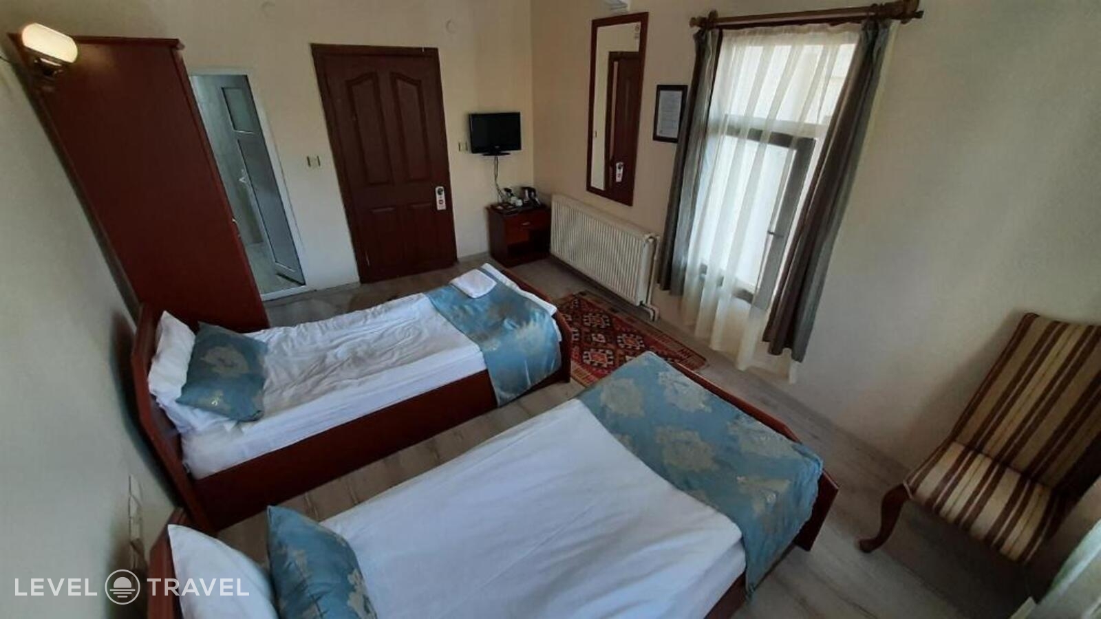 фотографии номера Стандартный (две односпальные кровати) отеля Guven Cave Hotel в Турция(Гёреме) - фото №9