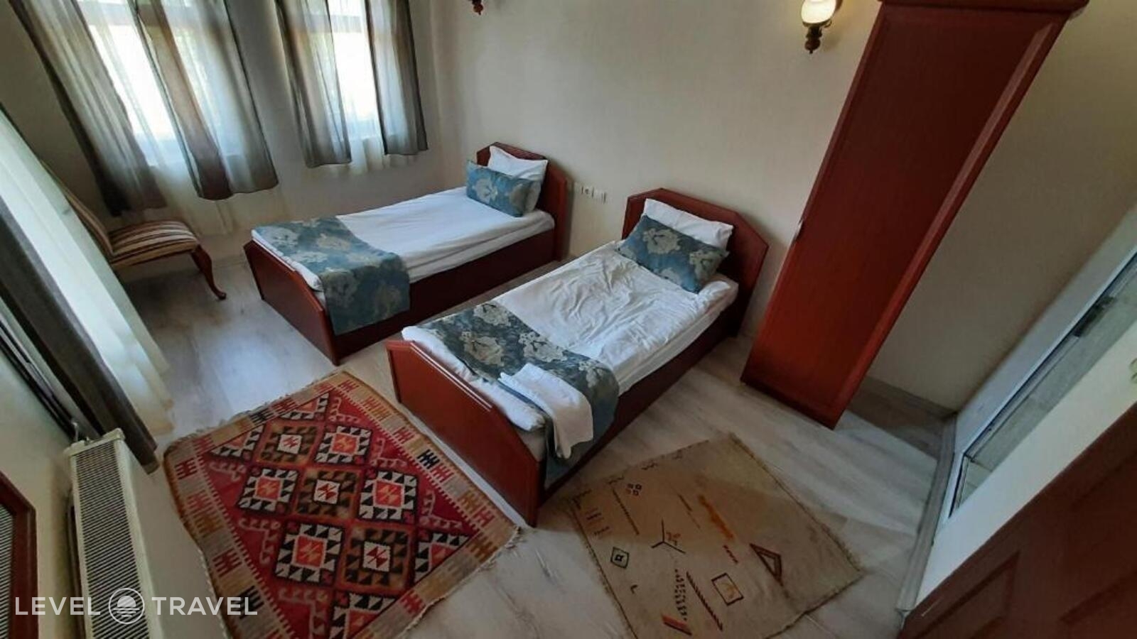 фотографии номера Стандартный (две односпальные кровати) отеля Guven Cave Hotel в Турция(Гёреме) - фото №7