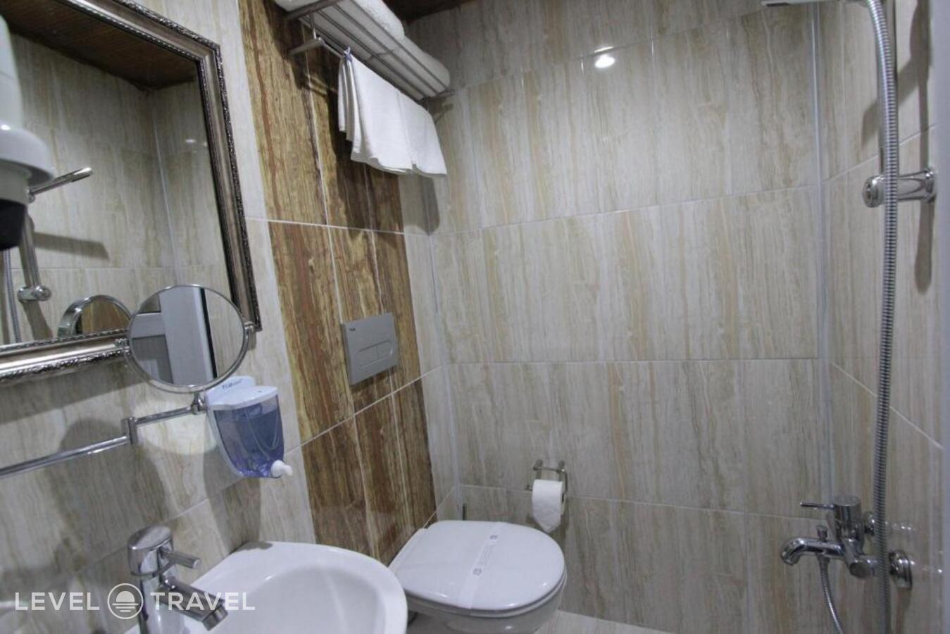 фотографии номера Стандартный (две односпальные кровати) отеля Guven Cave Hotel в Турция(Гёреме) - фото №4