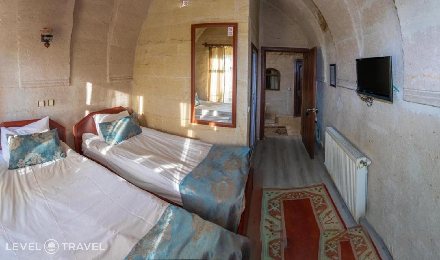 фотографии номера Стандартный (две односпальные кровати) отеля Guven Cave Hotel в Турция(Гёреме) - фото №6