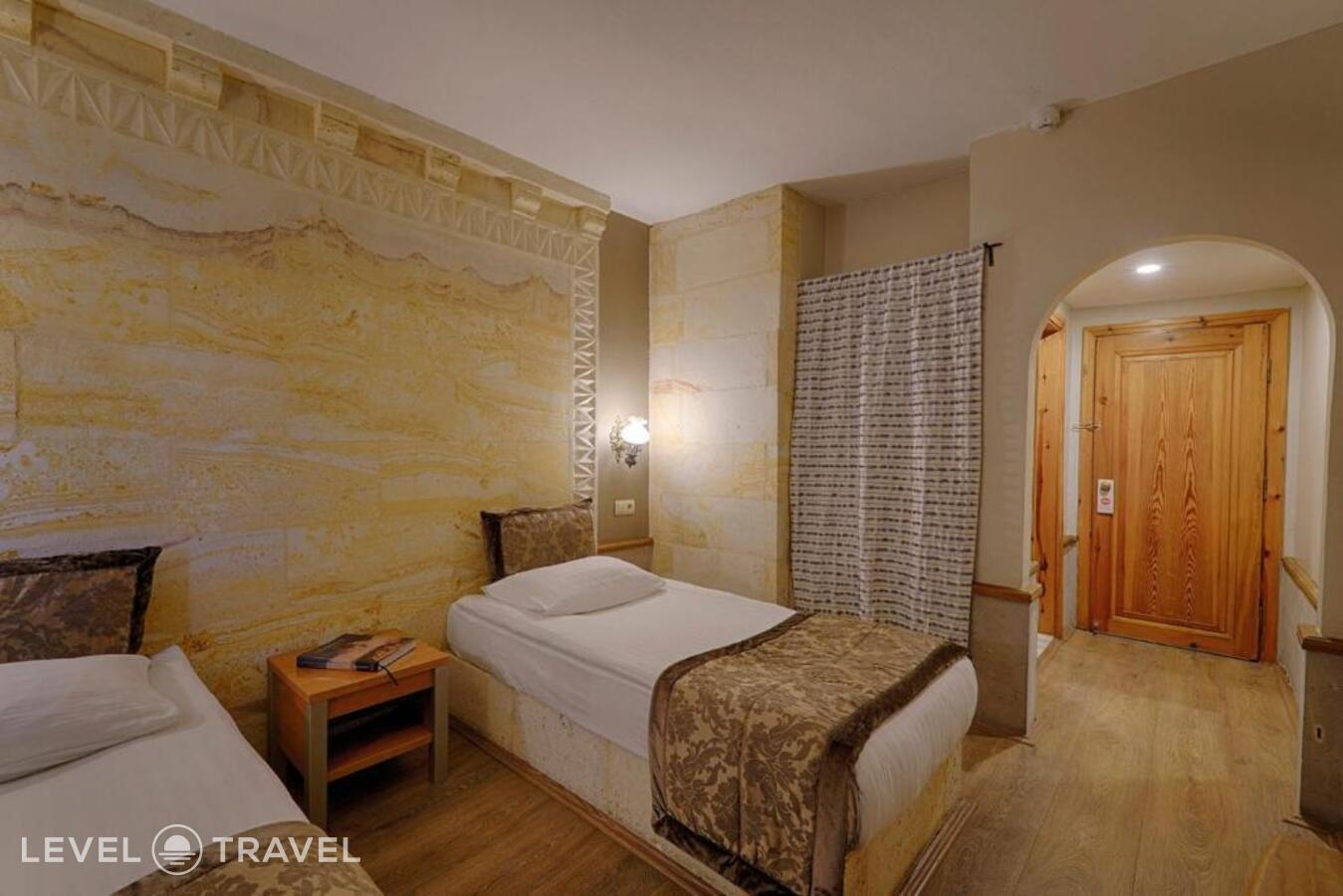 фотографии номера Стандартный (две односпальные кровати) отеля Heybe Hotel в Турция(Гёреме) - фото №5