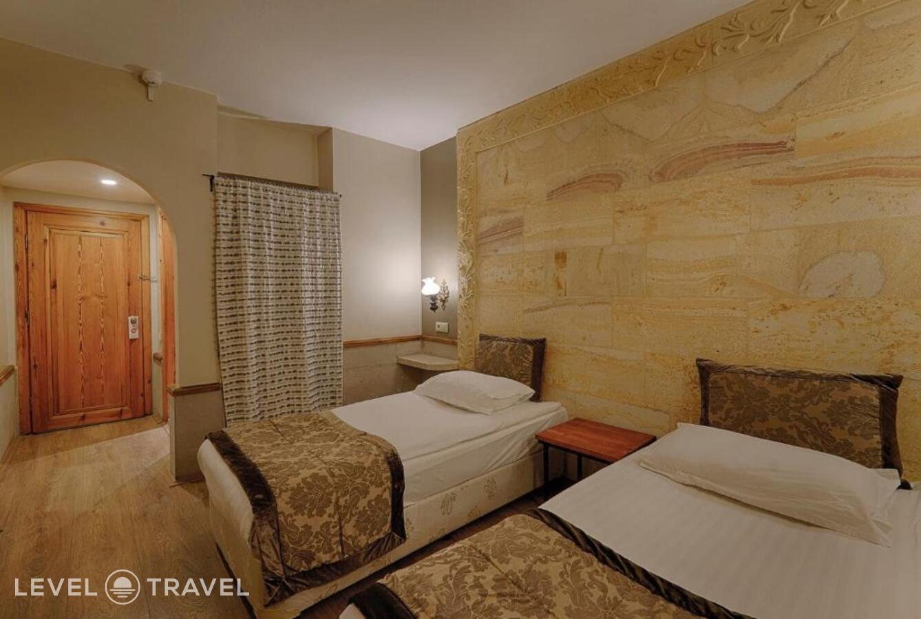фотографии номера Стандартный (две односпальные кровати) отеля Heybe Hotel в Турция(Гёреме) - фото №3