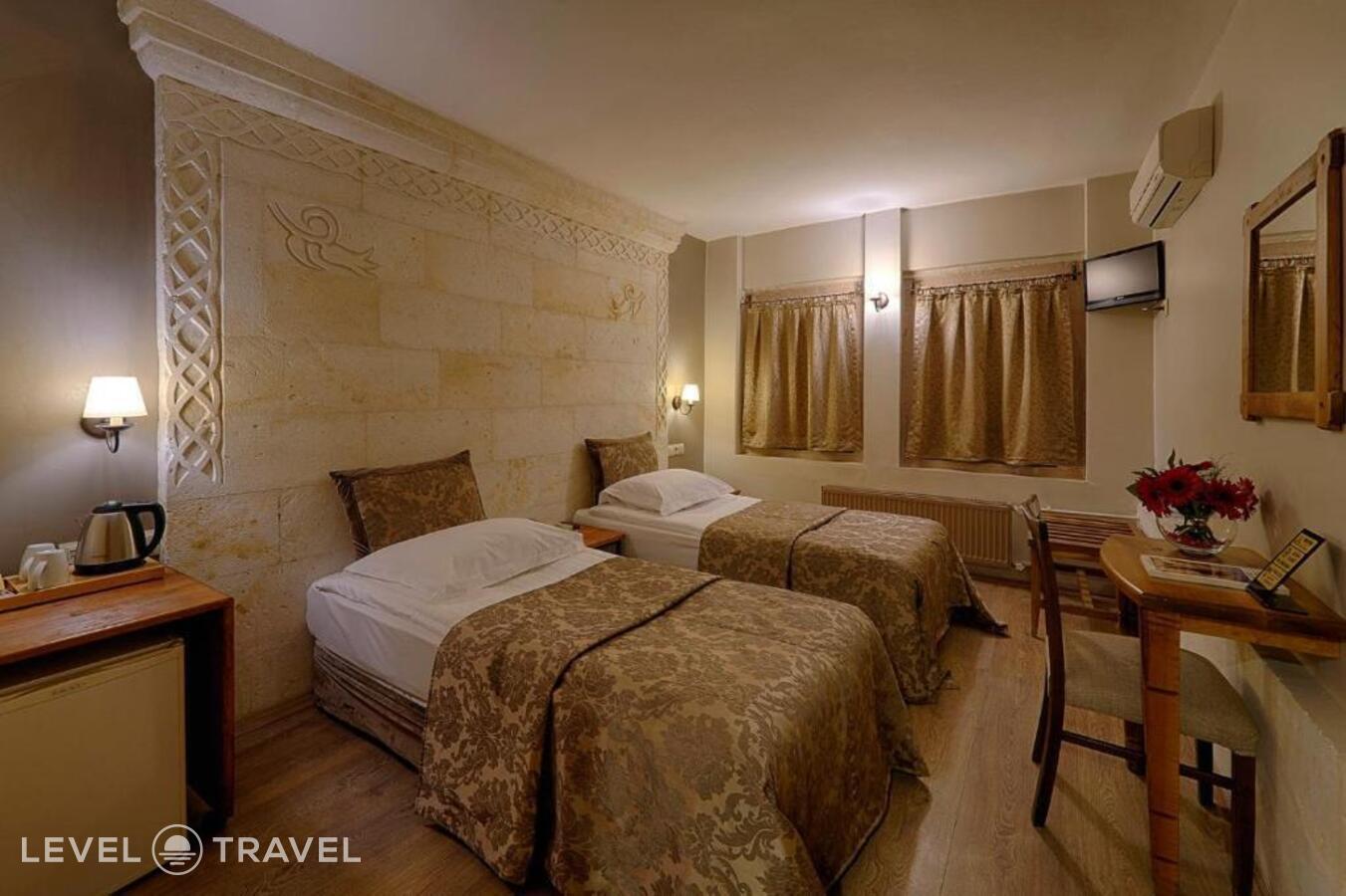 фотографии номера Стандартный (две односпальные кровати) отеля Heybe Hotel в Турция(Гёреме) - фото №9
