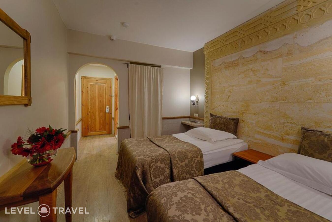 фотографии номера Стандартный (две односпальные кровати) отеля Heybe Hotel в Турция(Гёреме) - фото №8