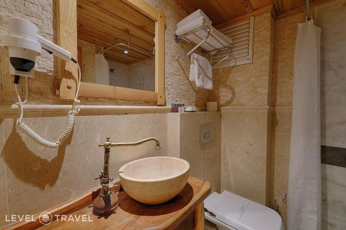 фотографии номера Стандартный (две односпальные кровати) отеля Heybe Hotel в Турция(Гёреме) - фото №7