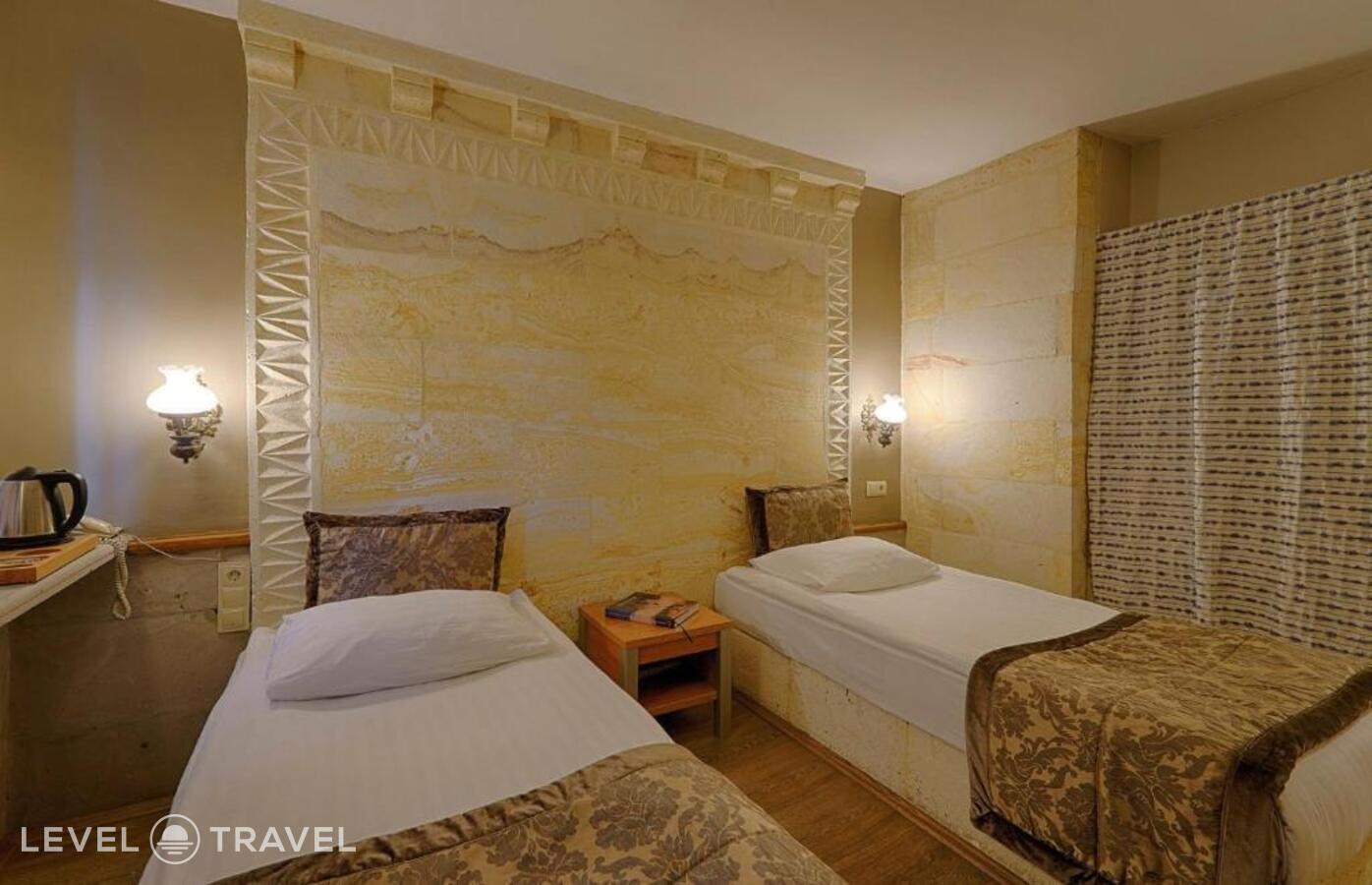 фотографии номера Стандартный (две односпальные кровати) отеля Heybe Hotel в Турция(Гёреме) - фото №13