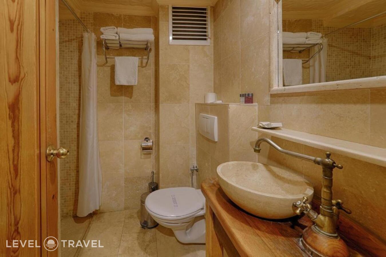 фотографии номера Стандартный (две односпальные кровати) отеля Heybe Hotel в Турция(Гёреме) - фото №4