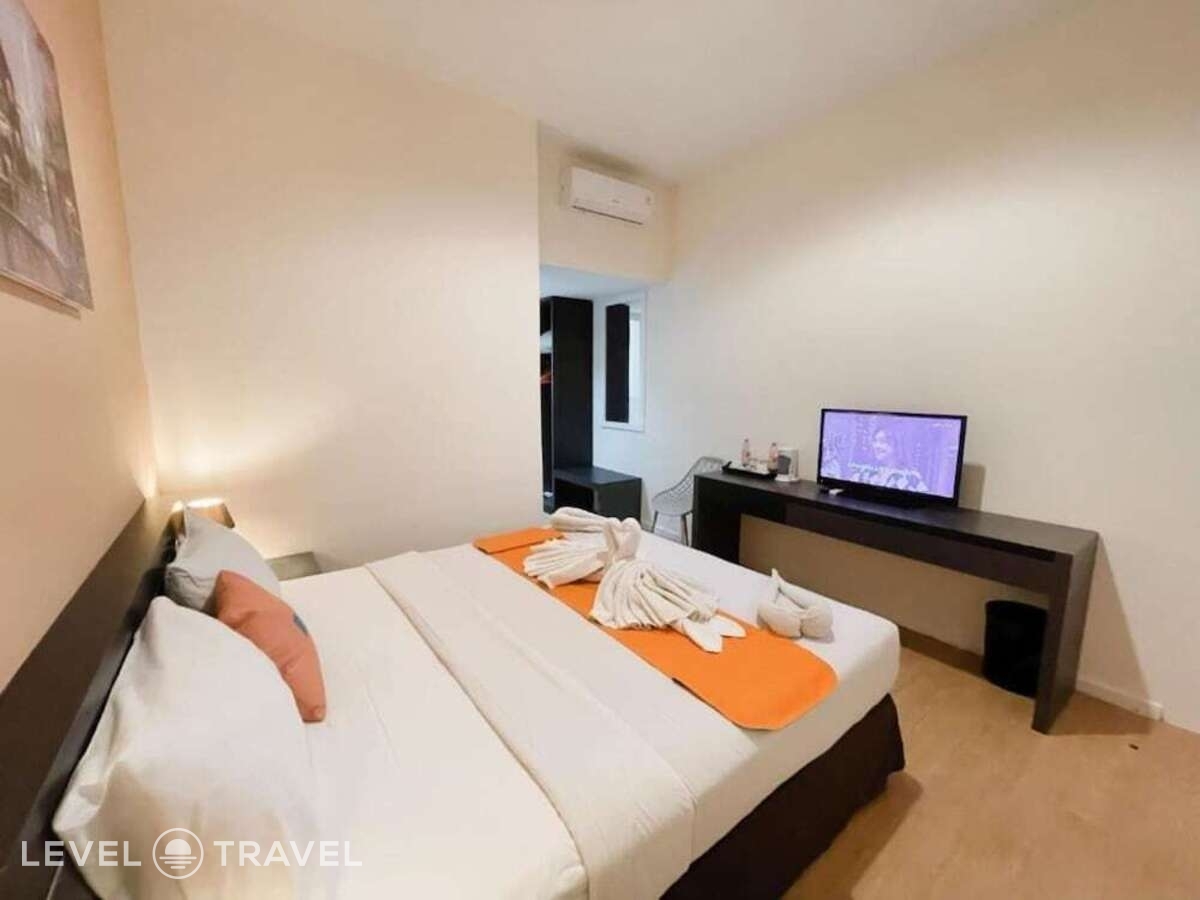 фотографии номера Улучшенный (две односпальные кровати) отеля Sunset Point Hotel Seminyak в Индонезия(Семиньяк) - фото №6
