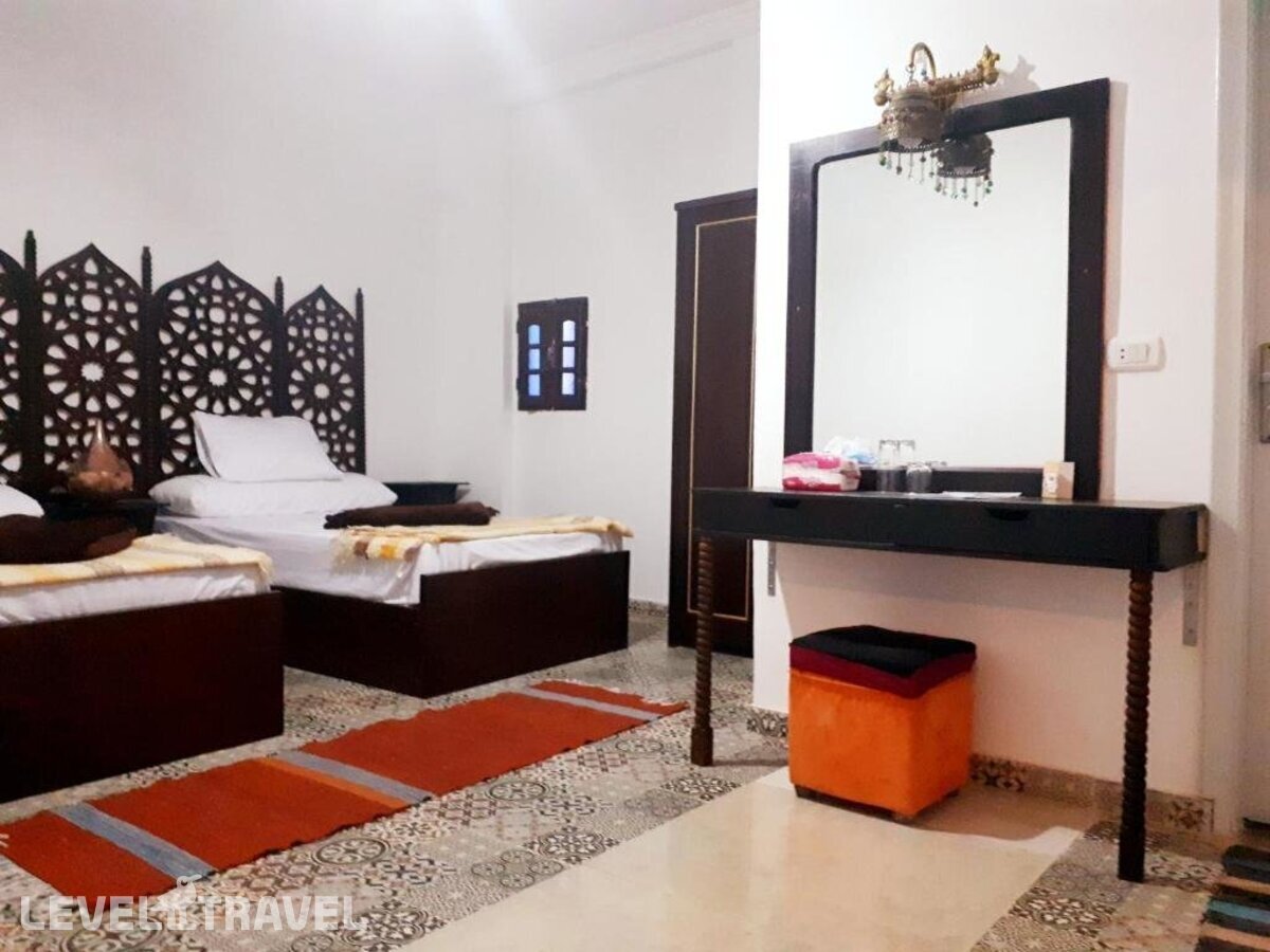 фотографии номера Стандартный (две односпальные кровати) отеля Arabian Nights Pyramids Guesthouse в Египет(Гиза) - фото №2