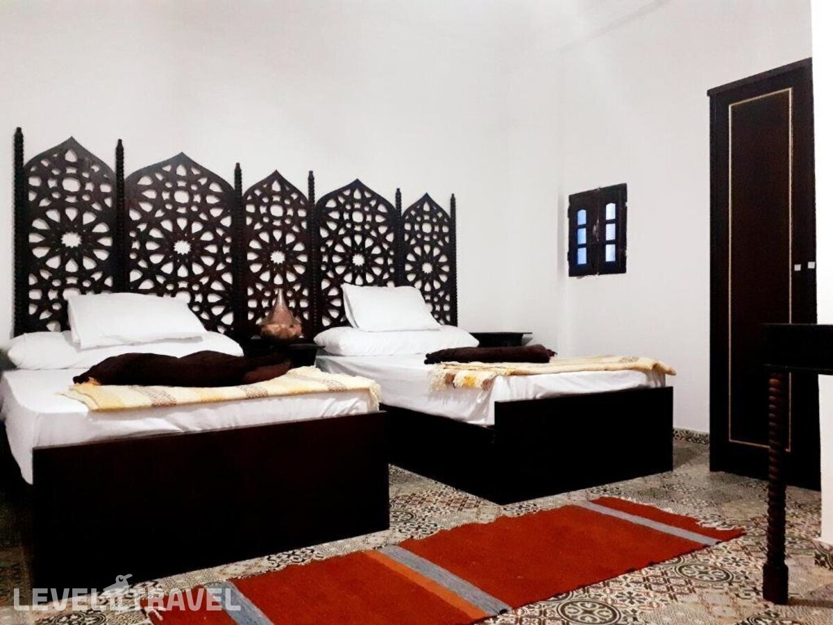 фотографии номера Стандартный (две односпальные кровати) отеля Arabian Nights Pyramids Guesthouse в Египет(Гиза) - фото №5