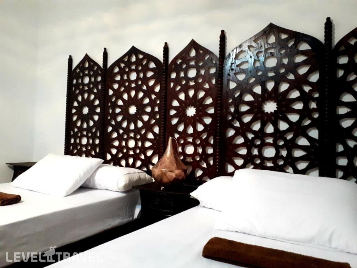 фотографии номера Стандартный (две односпальные кровати) отеля Arabian Nights Pyramids Guesthouse в Египет(Гиза) - фото №1