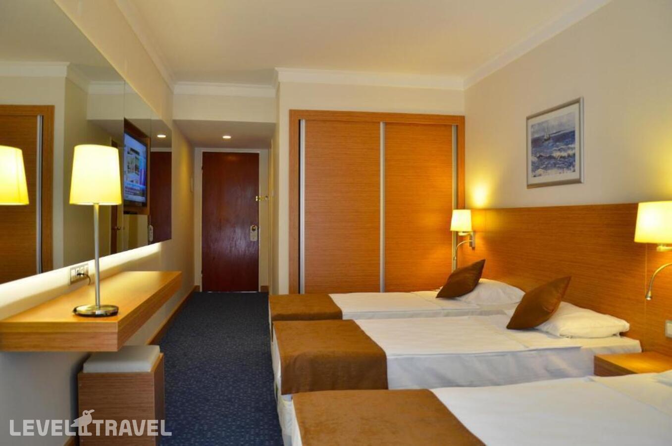 фотографии номера Семейный номер отеля Hotel Grand Efe в Турция(Оздере) - фото №1