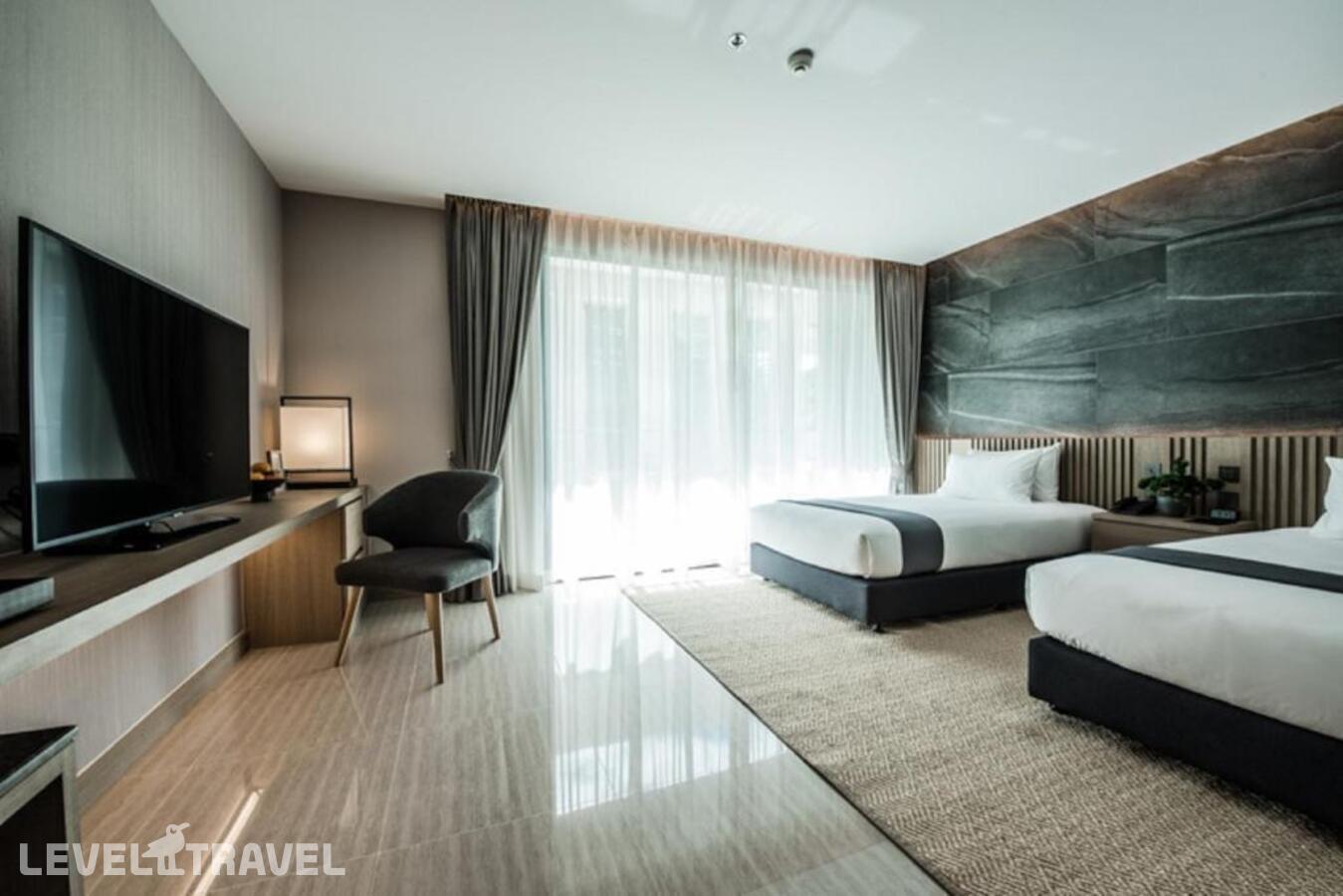 фотографии номера Делюкс (две односпальные кровати) отеля Mandarin Eastville Pattaya в Таиланд(Наклуа) - фото №7
