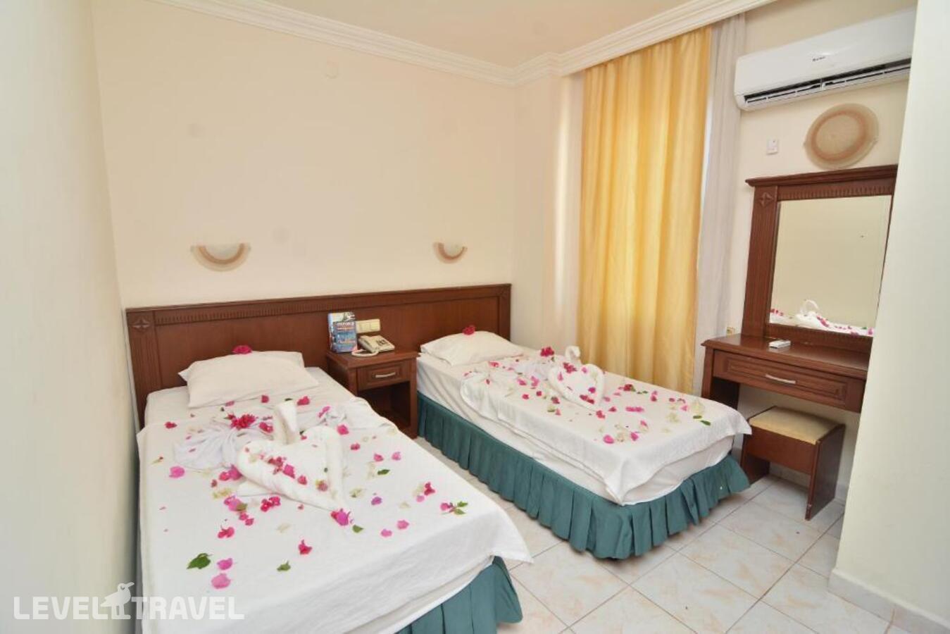 фотографии номера Стандартный (две односпальные кровати) отеля Rose Garden Apart Hotel в Турция(Аланья) - фото №4