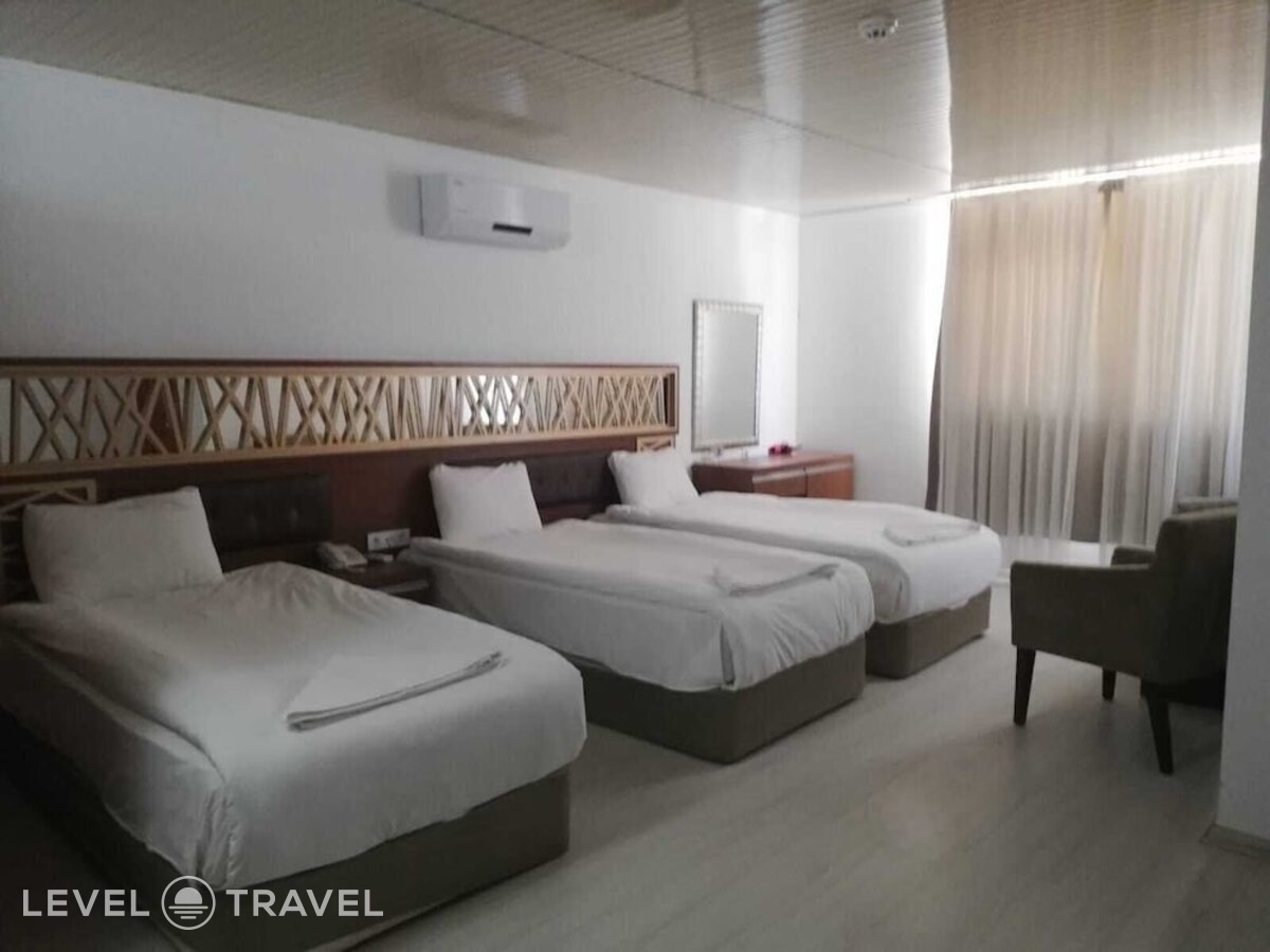 фотографии номера Трехместный номер отеля Gül Otel в Турция(Кадрие) - фото №2