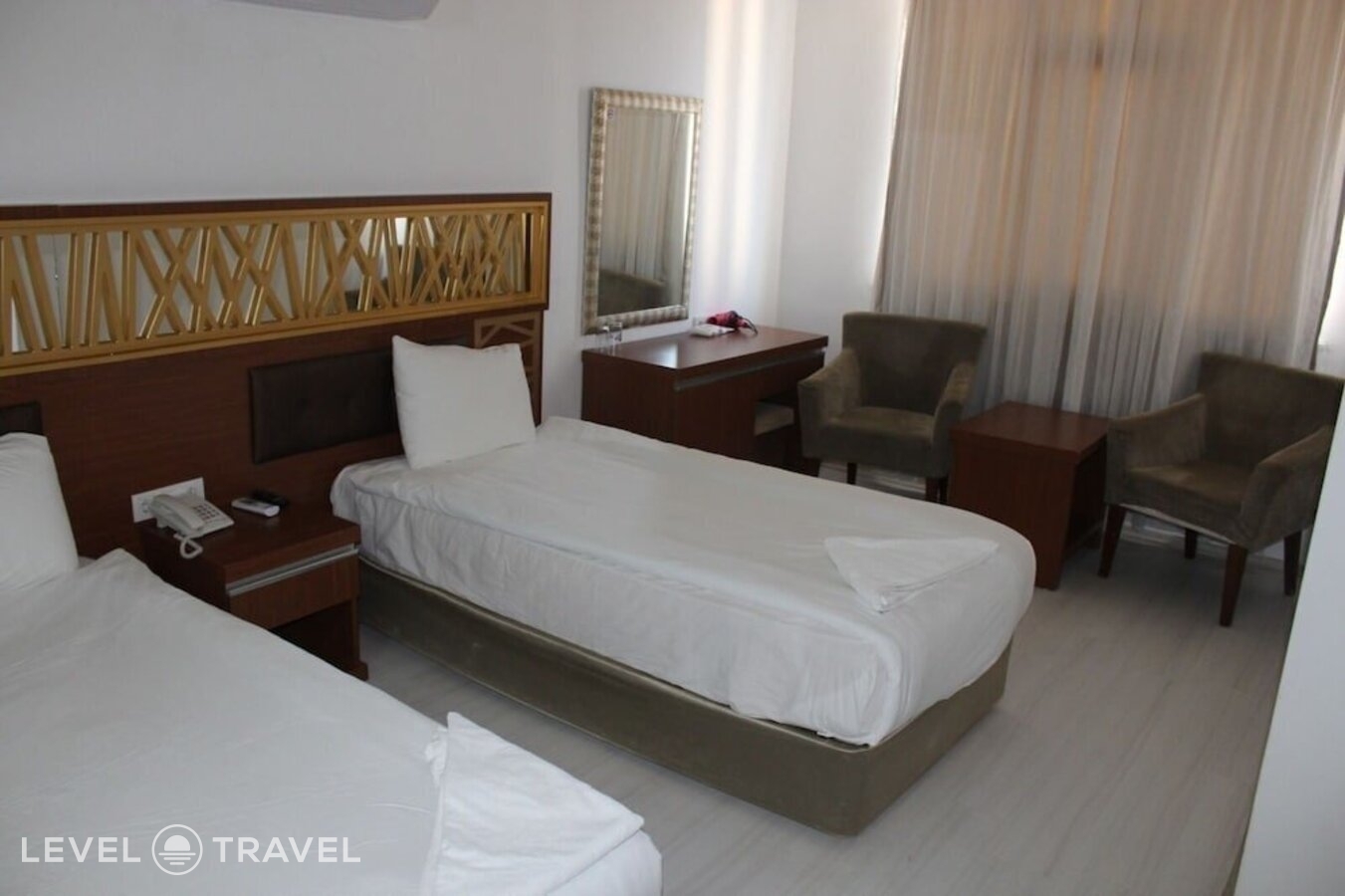 фотографии номера Трехместный номер отеля Gül Otel в Турция(Кадрие) - фото №5