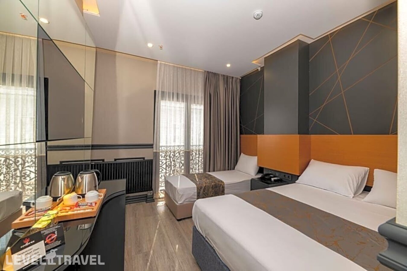 фотографии номера Делюкс (две односпальные кровати) отеля Confores Hotel в Турция(Бахчелиэвлер) - фото №9