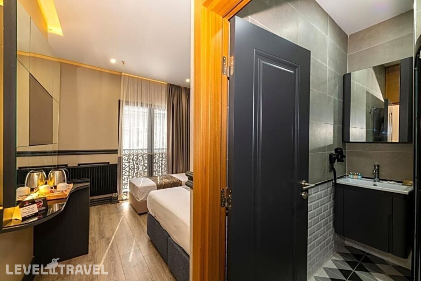 фотографии номера Делюкс (две односпальные кровати) отеля Confores Hotel в Турция(Бахчелиэвлер) - фото №10