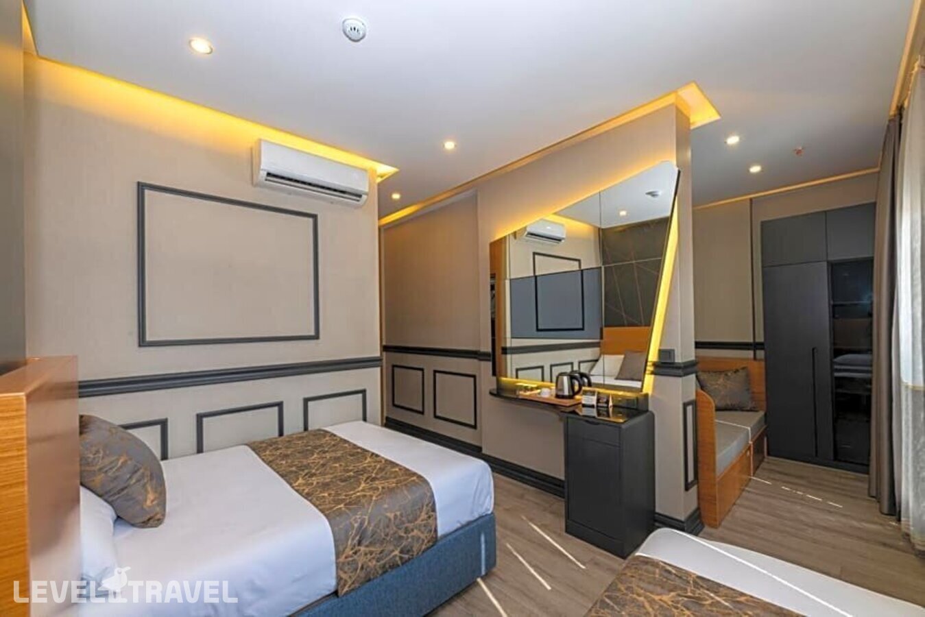 фотографии номера Делюкс (две односпальные кровати) отеля Confores Hotel в Турция(Бахчелиэвлер) - фото №4