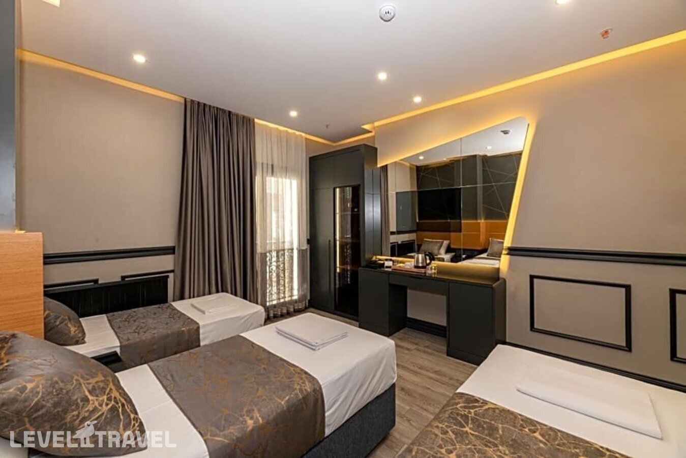 фотографии номера Делюкс (две односпальные кровати) отеля Confores Hotel в Турция(Бахчелиэвлер) - фото №5