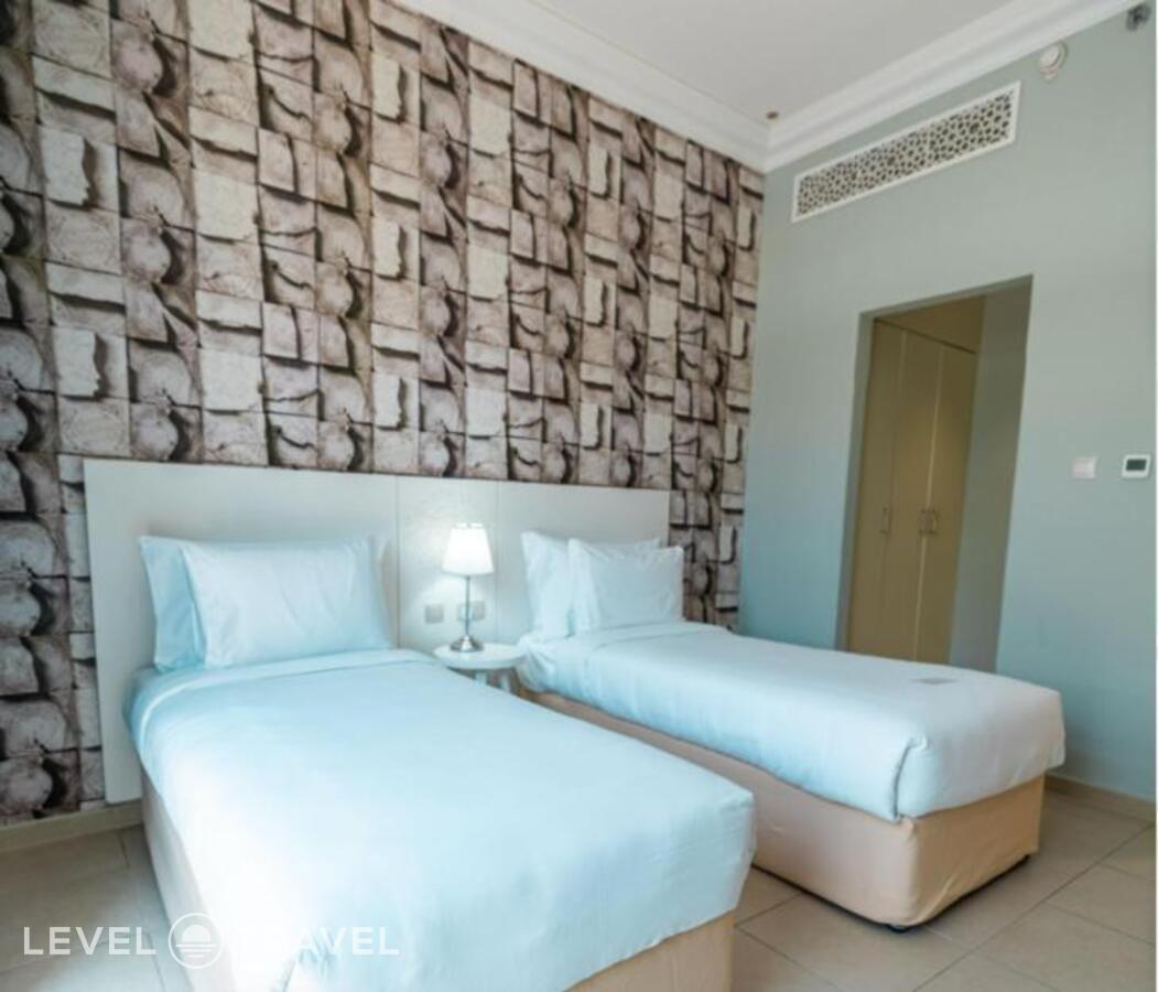 фотографии номера Стандартный (две односпальные кровати) отеля Andalus Al Seef Resort & Spa в ОАЭ(Абу-Даби) - фото №101