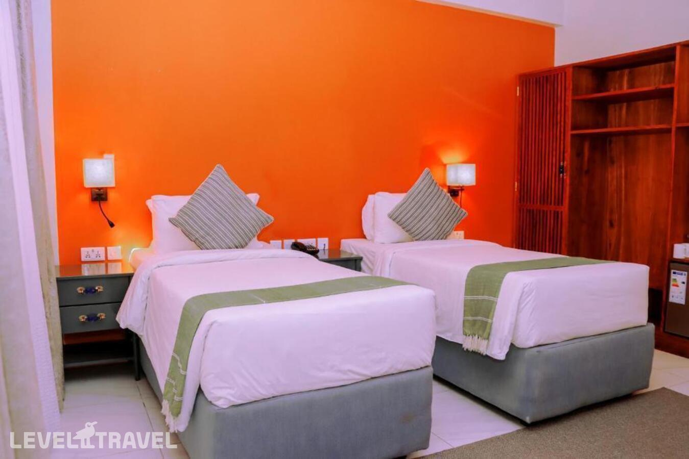 фотографии номера Делюкс (две односпальные кровати) отеля Jangwani Sea Breeze Resort в Танзания(Дар-эс-Салам) - фото №2
