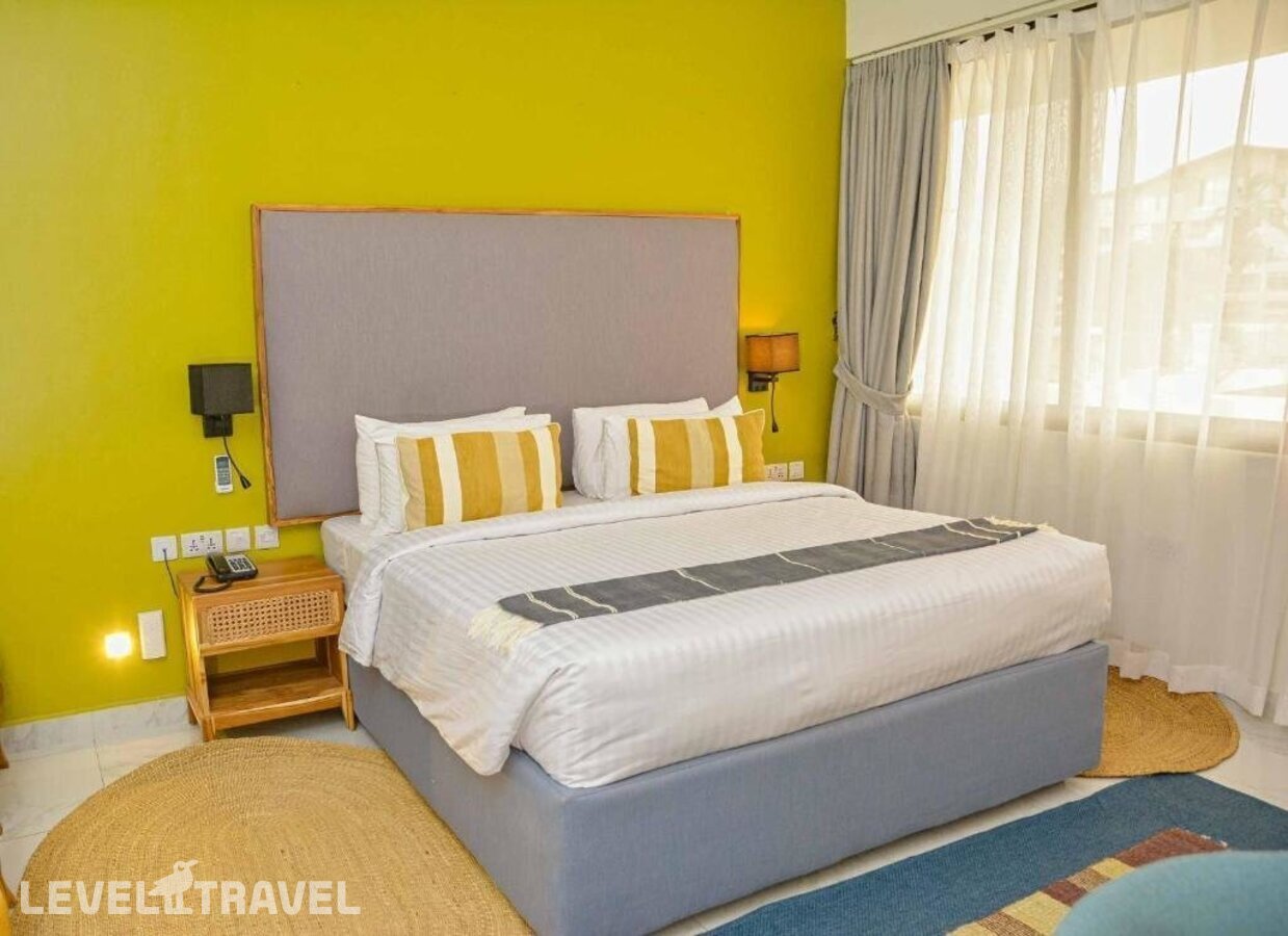 фотографии номера Представительский (две односпальные кровати) отеля Jangwani Sea Breeze Resort в Танзания(Дар-эс-Салам) - фото №1