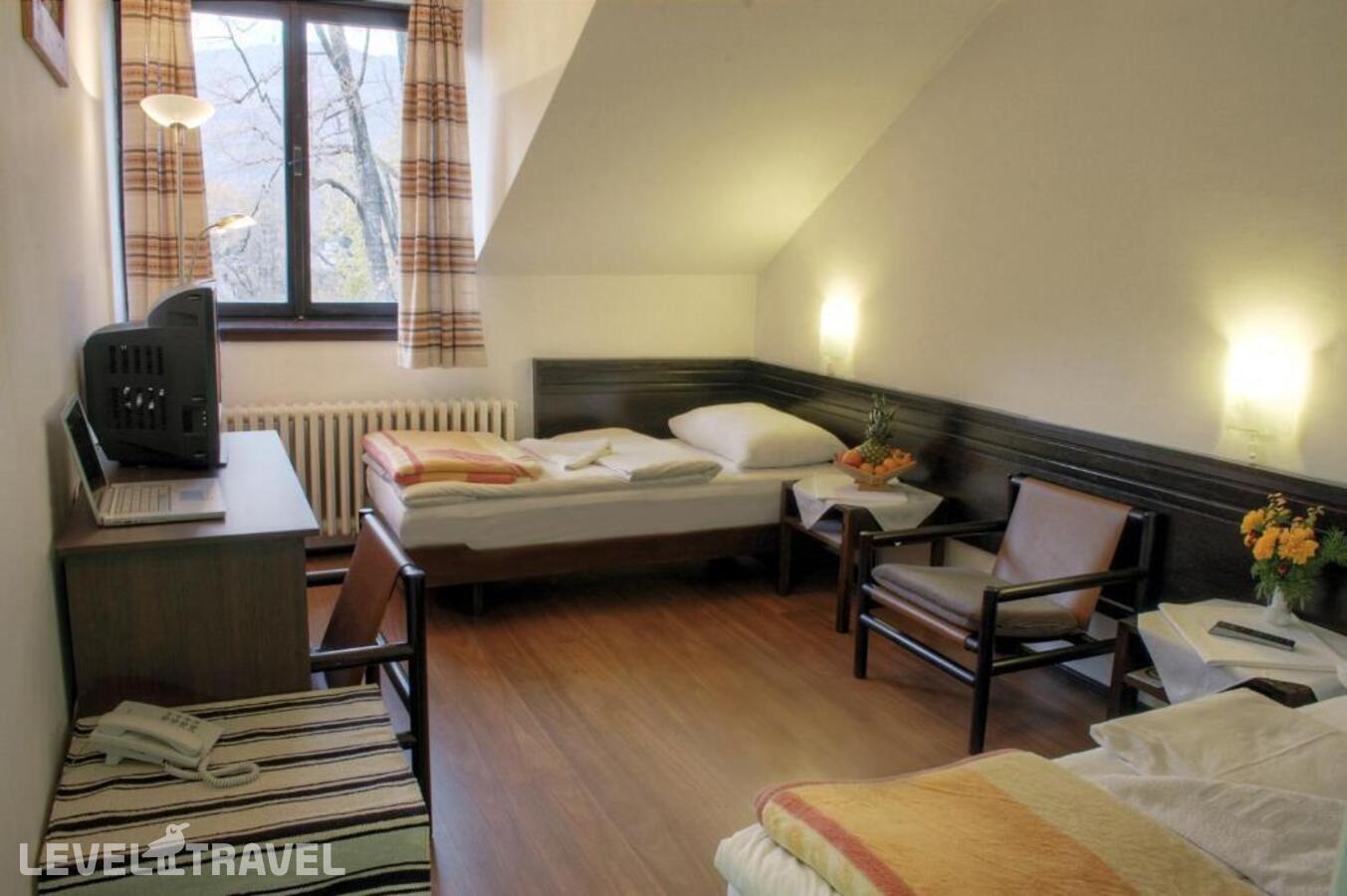 фотографии номера Стандартный (две односпальные кровати) отеля Hotel Komovi в Черногория(Андриевица) - фото №6