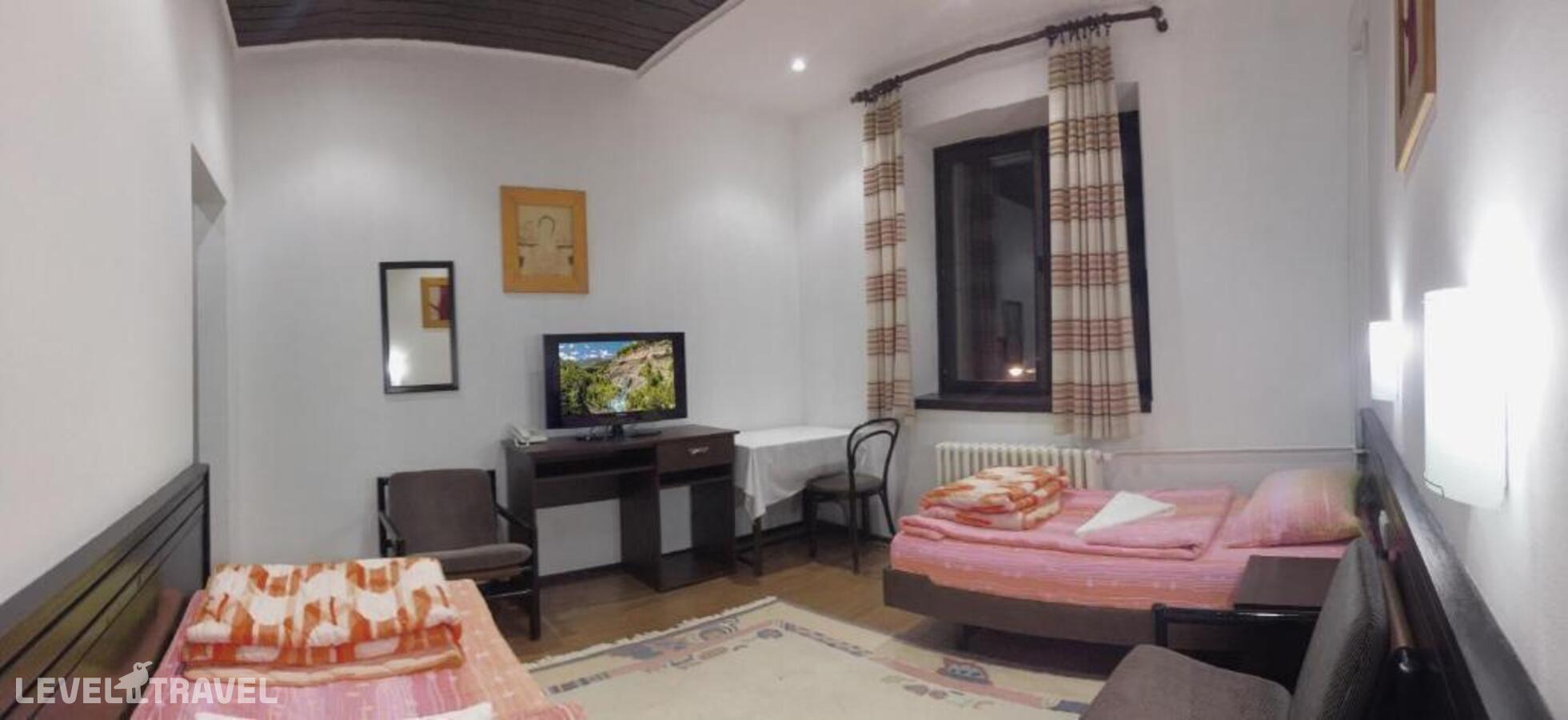 фотографии номера Стандартный (две односпальные кровати) отеля Hotel Komovi в Черногория(Андриевица) - фото №8