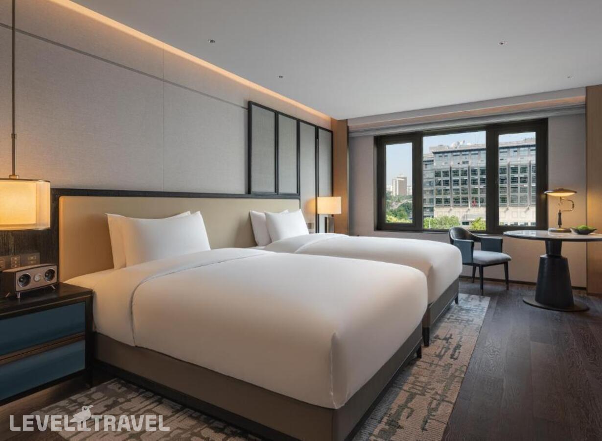 фотографии номера Делюкс (две односпальные кровати) отеля Empark Prime Hotel Beijing в Китай(Пекин) - фото №3